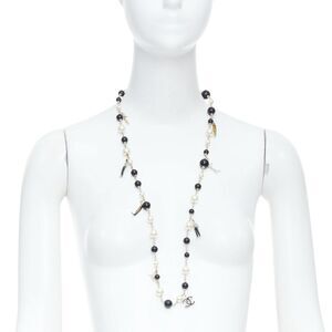 CHANEL 10C Runway CC Logo Faux Pearl Sautoir coco figurine charm necklace